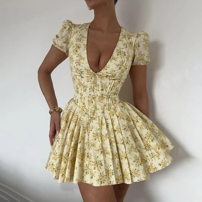 Romy Sommerkleid für Damen | Kurzes Blumenkleid mit Puffärmeln & Rückenausschnitt mit Schleife