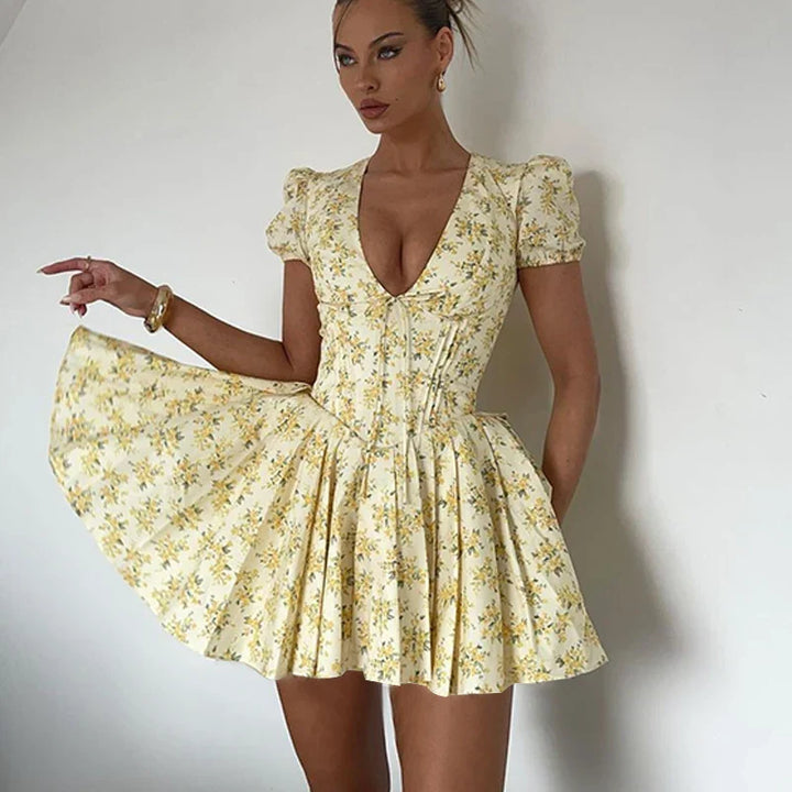 Romy Sommerkleid für Damen | Kurzes Blumenkleid mit Puffärmeln & Rückenausschnitt mit Schleife