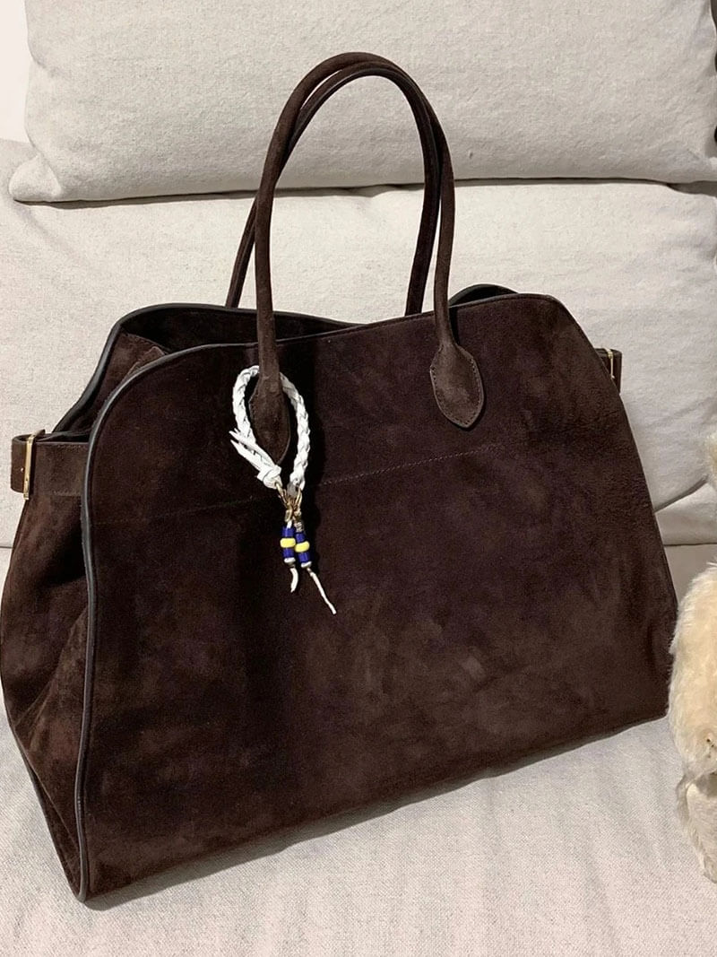 Elegante Damenhandtasche aus pflanzlich gegerbtem Leder und mit geräumigem Design