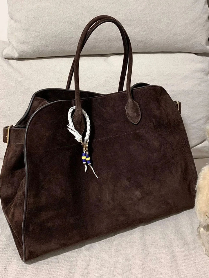 Elegante Damenhandtasche aus pflanzlich gegerbtem Leder und mit geräumigem Design