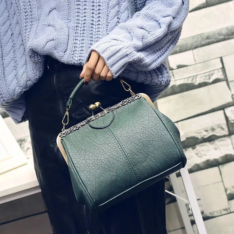 Coby | Bolso clásico con cierre de clip para mujer: atemporal, elegante y lujoso.