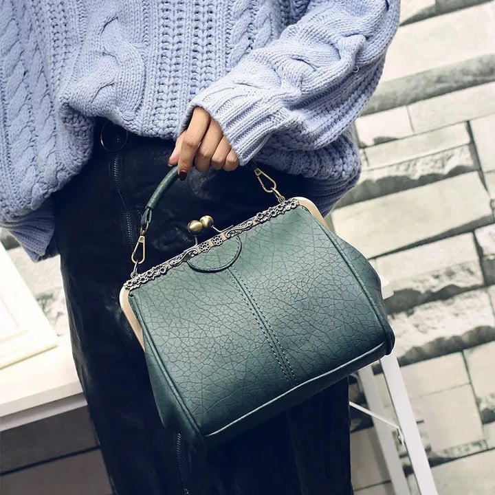 Coby | Bolso clásico con cierre de clip para mujer: atemporal, elegante y lujoso.